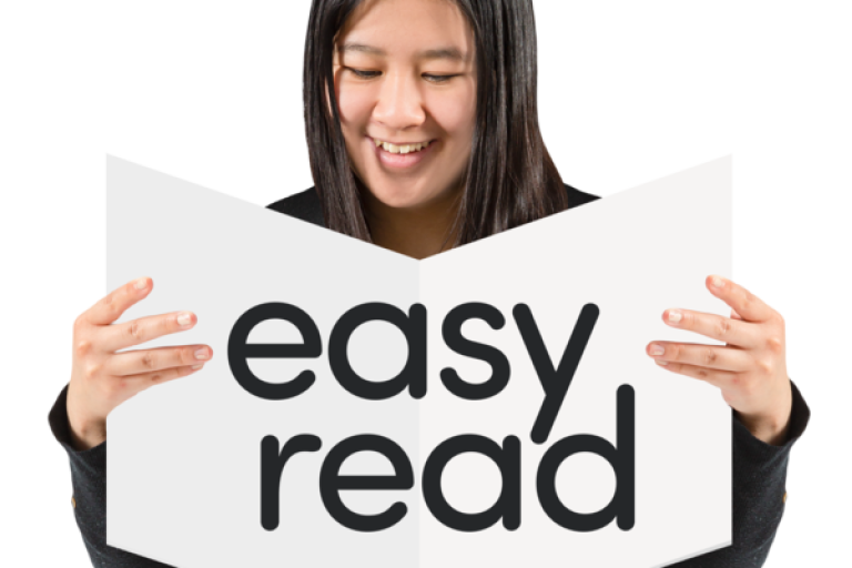 logo of easy read, a woman smiling and holding a book which says easy read